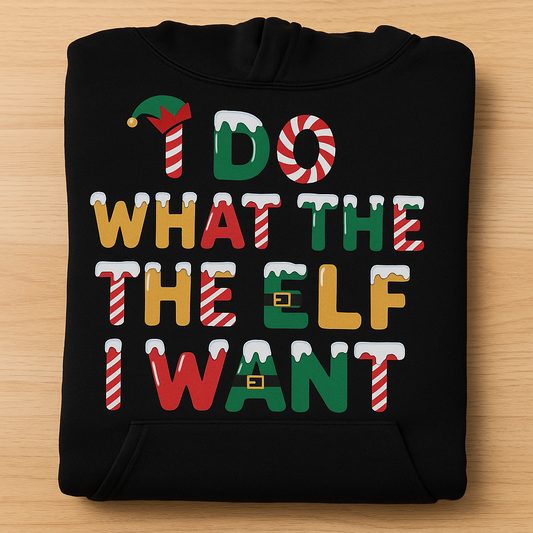 Black hoodie with colorful text design on a wooden surface