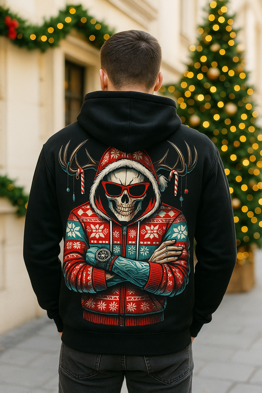 Person wearing a black hoodie with a colorful skull design in front of a decorated Christmas tree.