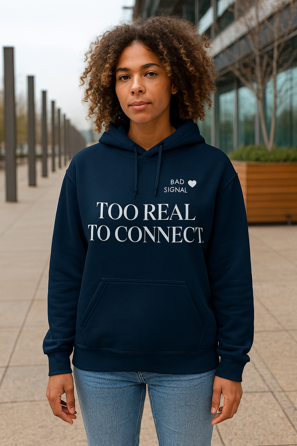 Model in navy blue Too Real to Connect hoodie by Dare 2 Wear — bold women’s street style.