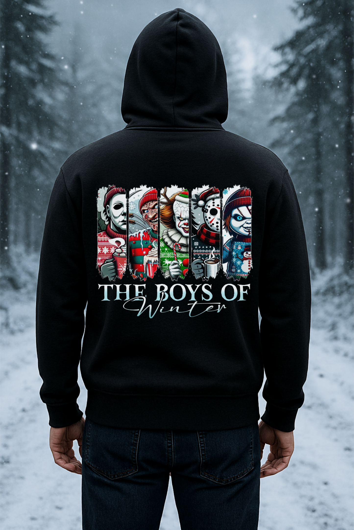 Person wearing a black hoodie with 'The Boys of Winter' design in a snowy forest setting