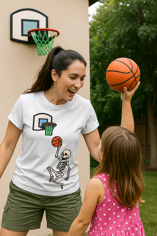 Mom wearing White T-shirt with cartoon skeleton dunking basketball near hoop – D2W original and child playing basketball in front of a basketball hoop