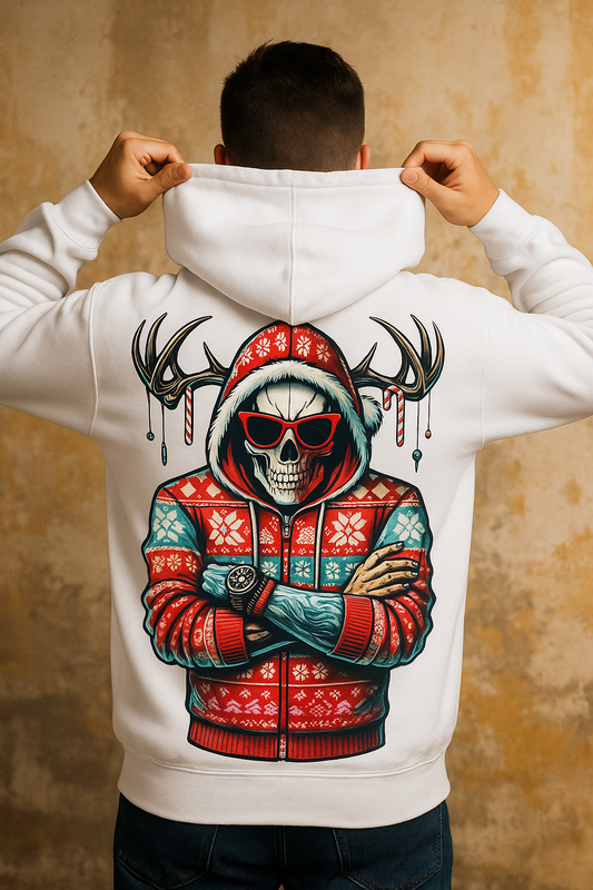 Person wearing a white hoodie with a colorful graphic design on the back against a beige wall.