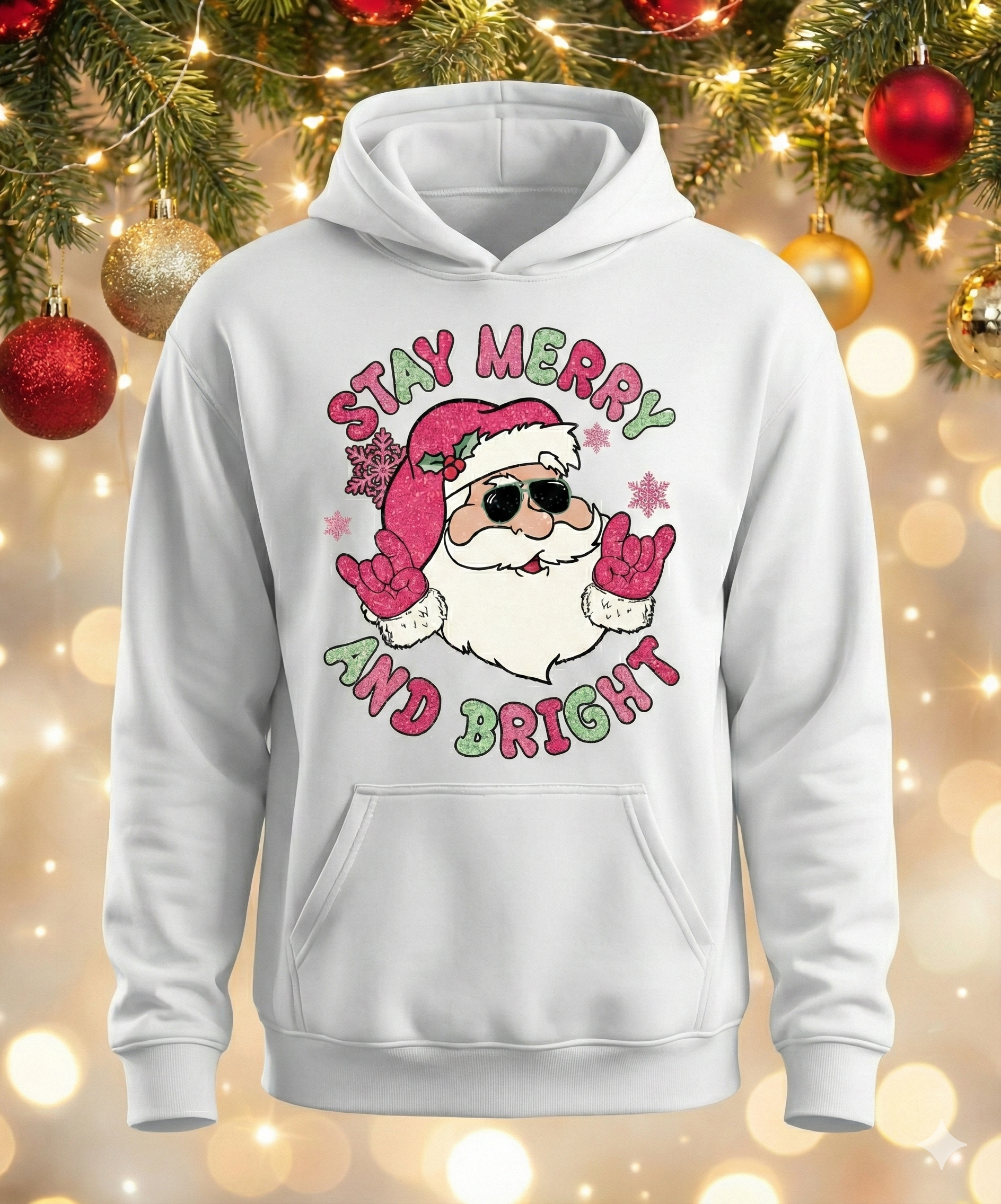 White hoodie with Santa Claus graphic and 'Stay Merry and Bright' text on a festive background.
